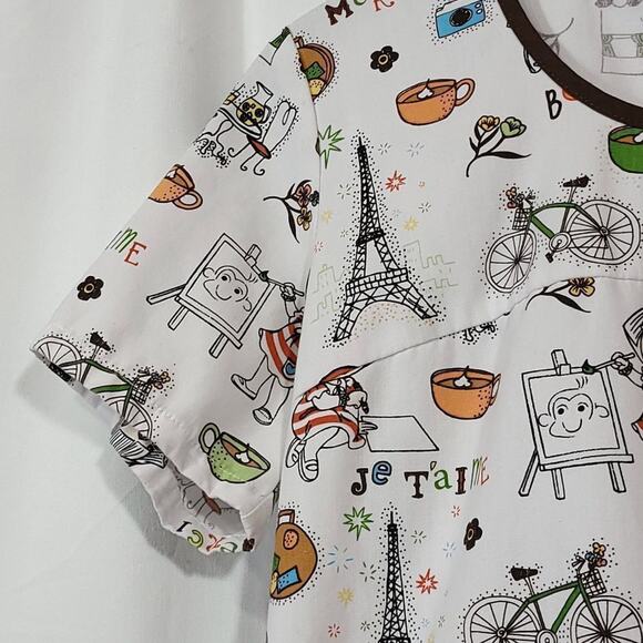 Dora Nickelodeon Scrub Top Size Xs French Paris Bike Eiffel Tower Coffee Cafe - Picture 6 of 6